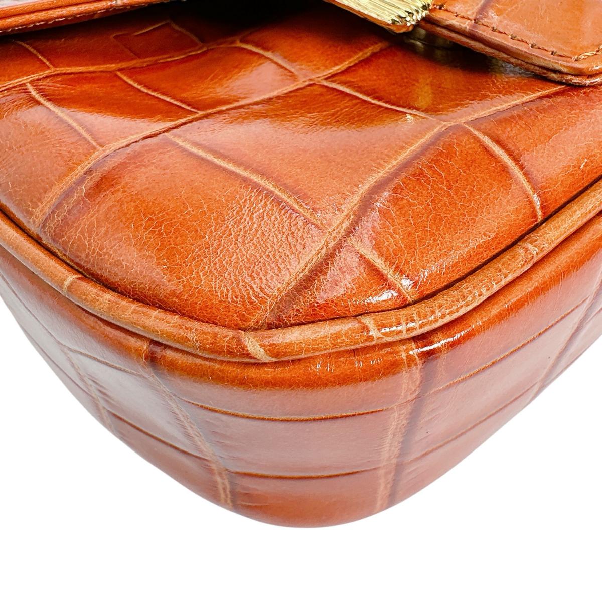 ウンガロ emanuel ungaro ショルダーバッグ
ショルダーバッグ クロコ型押 オレンジ 【SS】
【中古】