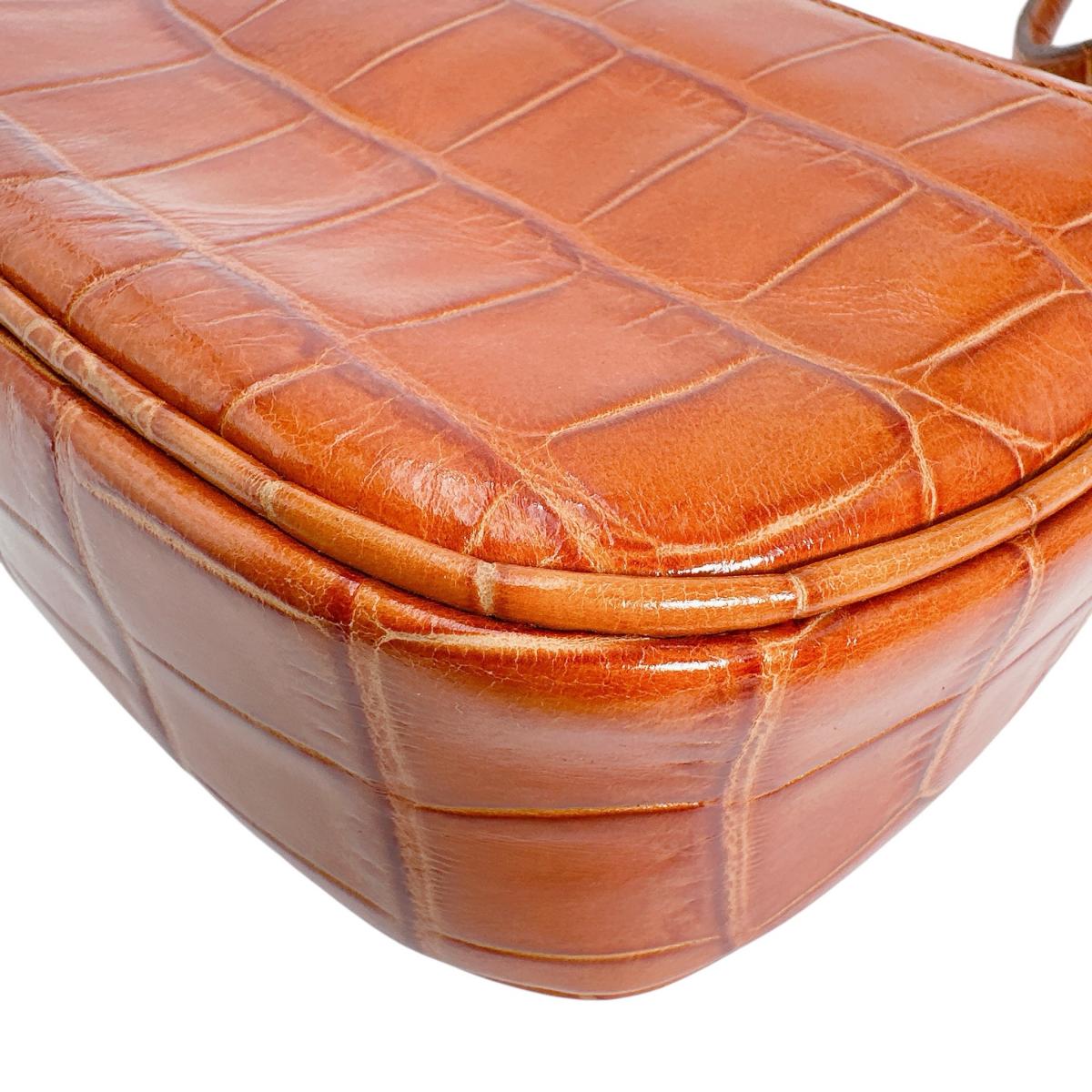 ウンガロ emanuel ungaro ショルダーバッグ
ショルダーバッグ クロコ型押 オレンジ 【SS】
【中古】