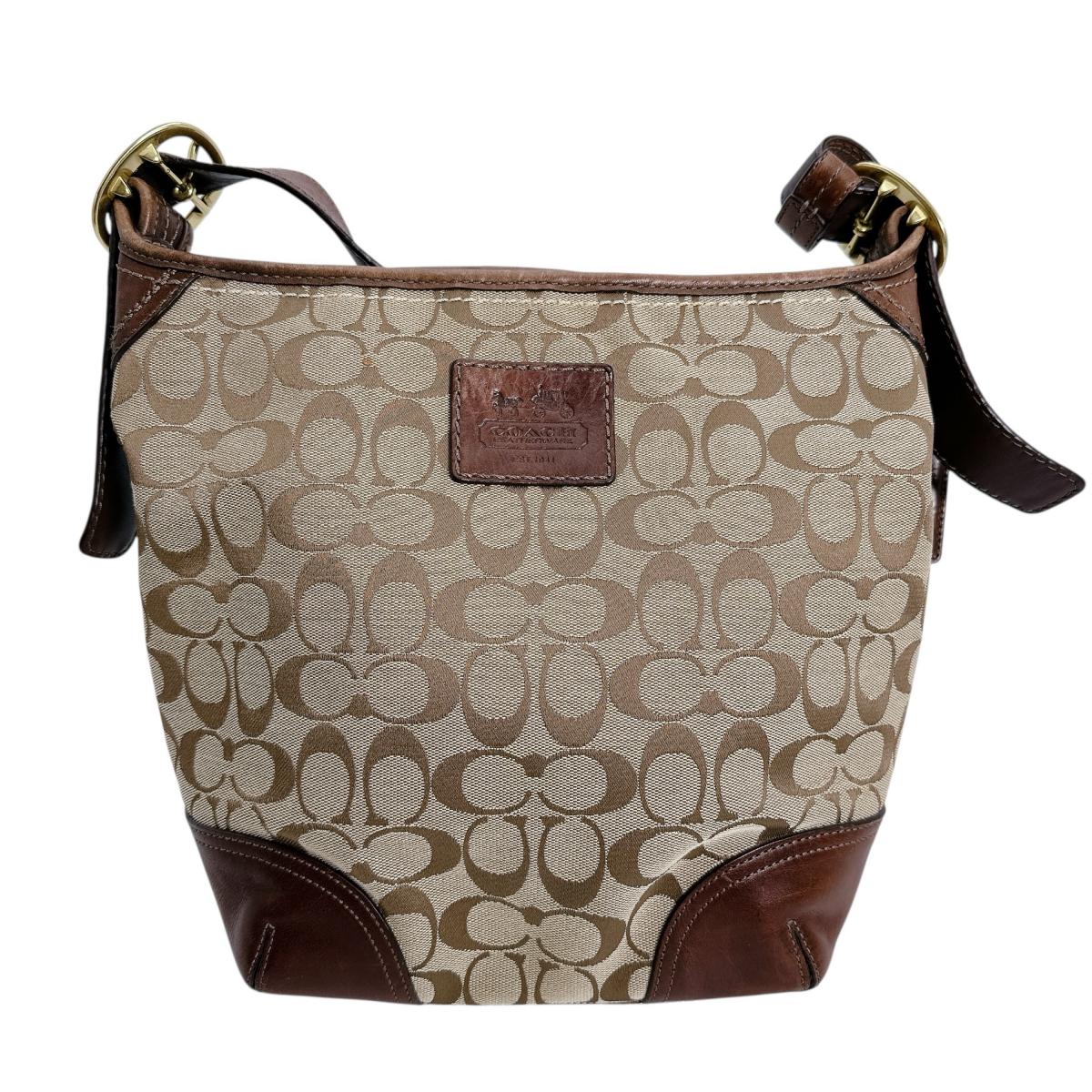 コーチ COACH ショルダーバッグ
斜めがけ 内側紫 シグネクチャー キャンバス L0893-12390 ベージュ 【SS】
【中古】
