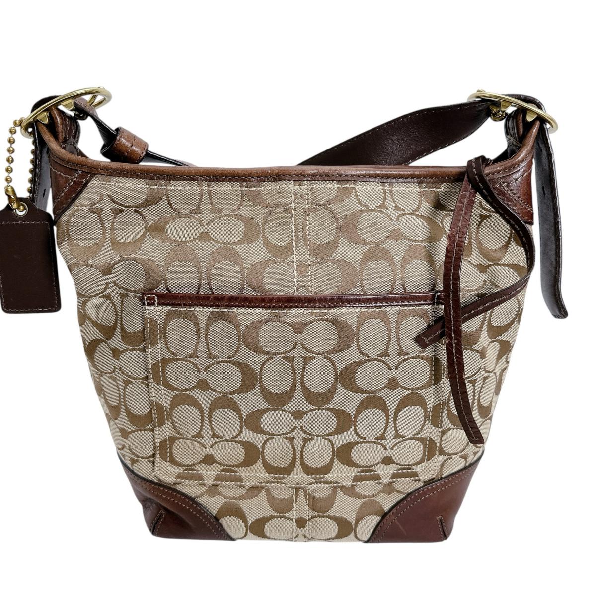 コーチ COACH ショルダーバッグ
斜めがけ 内側紫 シグネクチャー キャンバス L0893-12390 ベージュ 【SS】
【中古】