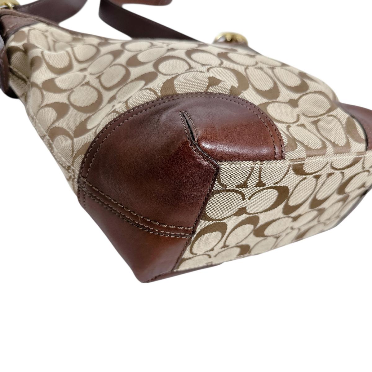 コーチ COACH ショルダーバッグ
斜めがけ 内側紫 シグネクチャー キャンバス L0893-12390 ベージュ 【SS】
【中古】