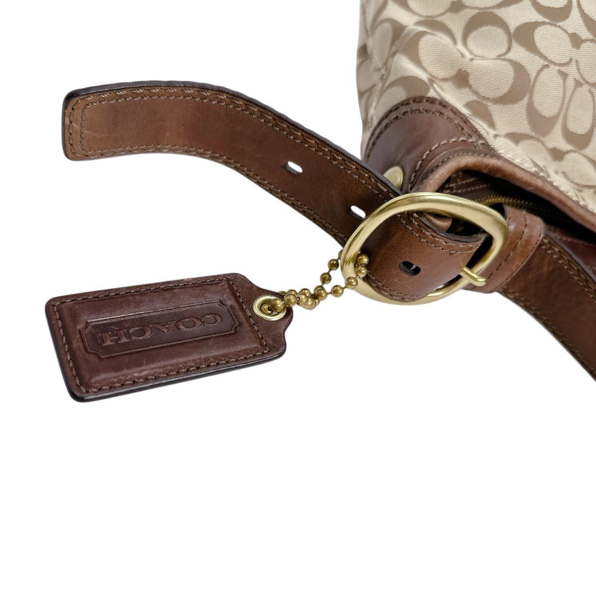 コーチ COACH ショルダーバッグ
斜めがけ 内側紫 シグネクチャー キャンバス L0893-12390 ベージュ 【SS】
【中古】