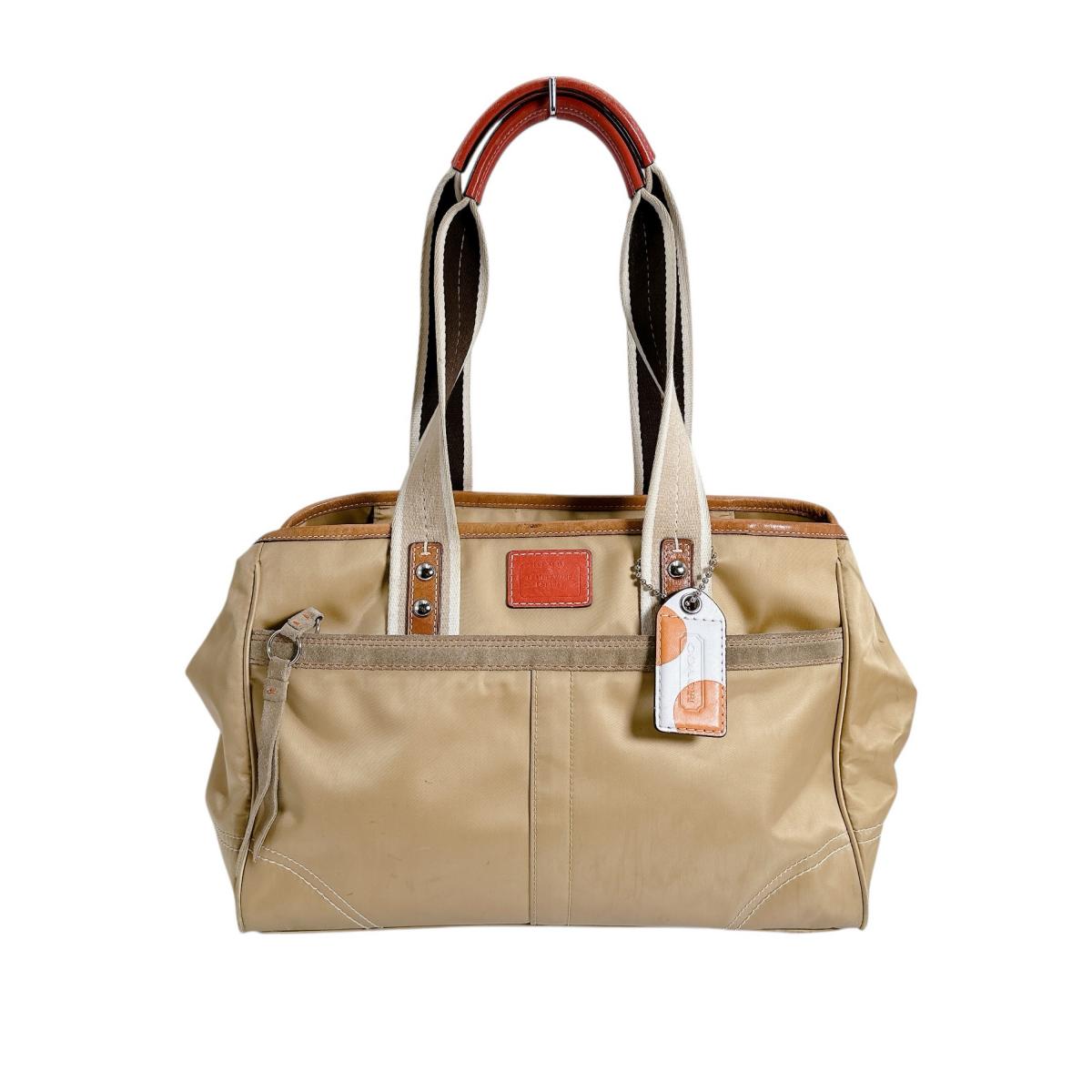 コーチ COACH ハンドバッグ
トートバッグ 無地 シグネチャー ナイロン MO682-10663 ゴールド 【SS】
【中古】