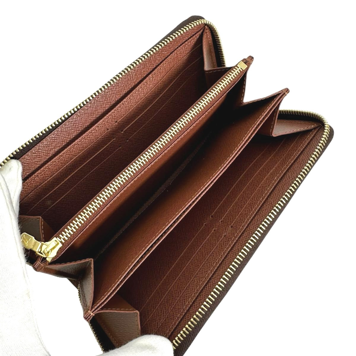 Louis Vuitton LOUIS VUITTON Long Wallet
Round Zipper Monogram Zippy Wallet Monogram Canvas M42616 Brown LV
【second hand】