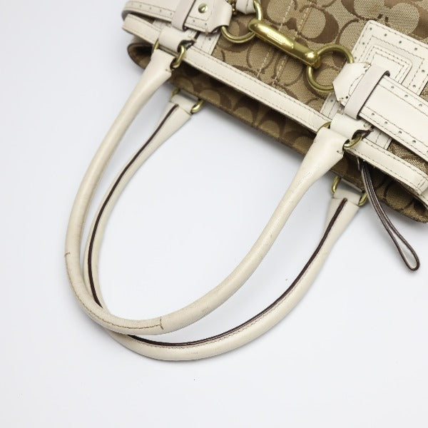 コーチ COACH ハンドバッグ
ハンプトンズシグネチャー キャリオール トートバッグ レザー F10507 カーキ×ブラウン 【SS】
【中古】