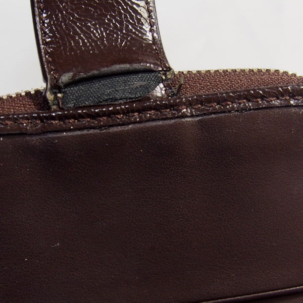 コーチ COACH 二つ折り財布
COACH シグネチャー キャンバス×パテント ラウンドファスナー レザー ブラウン×ベージュ 【SS】
【中古】