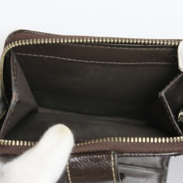コーチ COACH 二つ折り財布
COACH シグネチャー キャンバス×パテント ラウンドファスナー レザー ブラウン×ベージュ 【SS】
【中古】