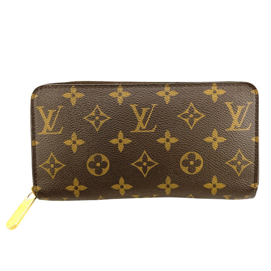 ルイヴィトン LOUIS VUITTON 長財布
 ラウンドファスナー モノグラム ジッピー・ウォレット モノグラムキャンバス M41895 ブラウン×フューシャ LV
 【SS】
 【中古】
