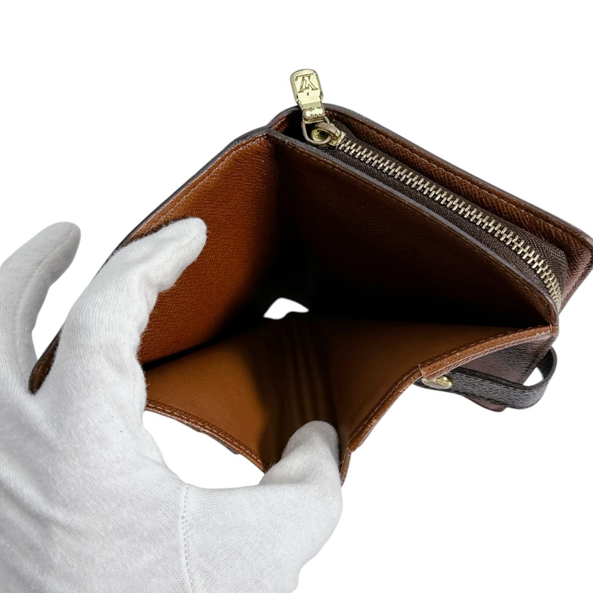 ルイヴィトン LOUIS VUITTON 二つ折り財布
カード用ポケットファスナー付 モノグラム コンパクトジップ モノグラムキャンバス M61667 ブラウン LV
【SS】
【中古】