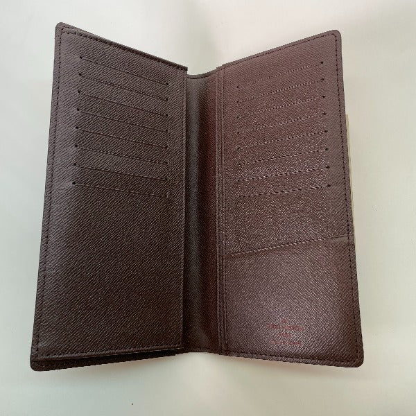 ルイヴィトン LOUIS VUITTON 札入れ
ポルトフォイユ・ロン ダミエ ダミエキャンバス N62228 ブラウン LV
【SS】
【中古】