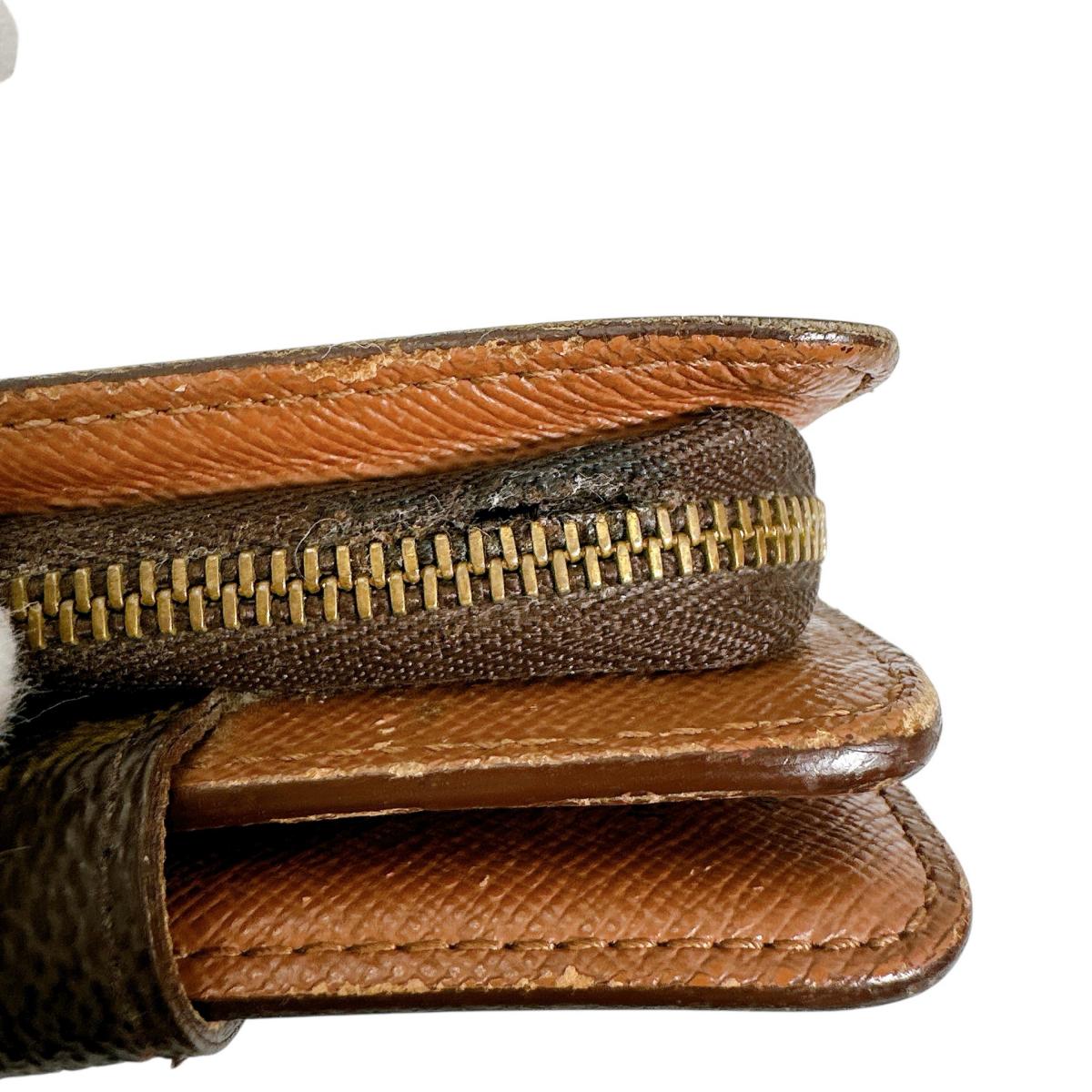 ルイヴィトン LOUIS VUITTON 二つ折り財布
カード用ポケットファスナー付 モノグラム コンパクトジップ モノグラムキャンバス M61667 ブラウン LV
【SS】
【中古】