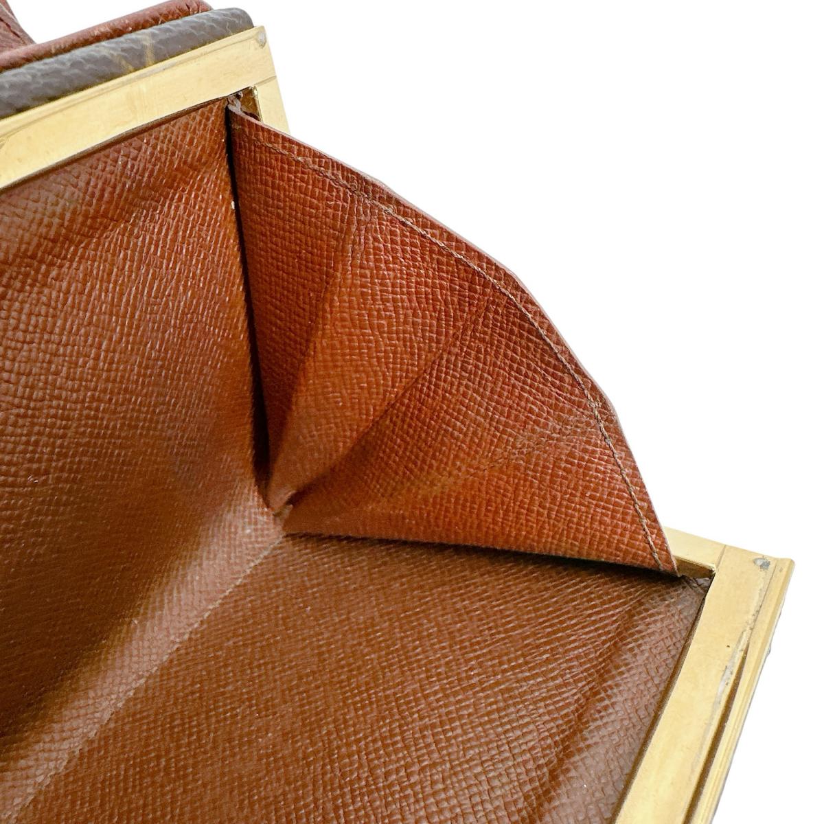 ルイヴィトン LOUIS VUITTON 二つ折り財布
カード用ポケット付がま口財布 モノグラム ポルト モネ・ビエ ヴィエノア モノグラムキャンバス M61663 ブラウン LV
【SS】
【中古】