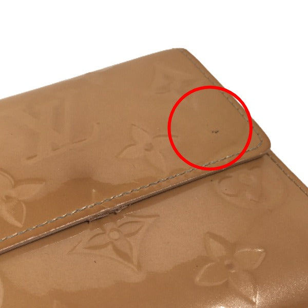 ルイヴィトン LOUIS VUITTON 二つ折り財布
Wホック財布 ヴェルニ ポルトモネ・ビエカルトクレディ モノグラムヴェルニ M91167 ソフトベージュ LV
【SS】
【中古】