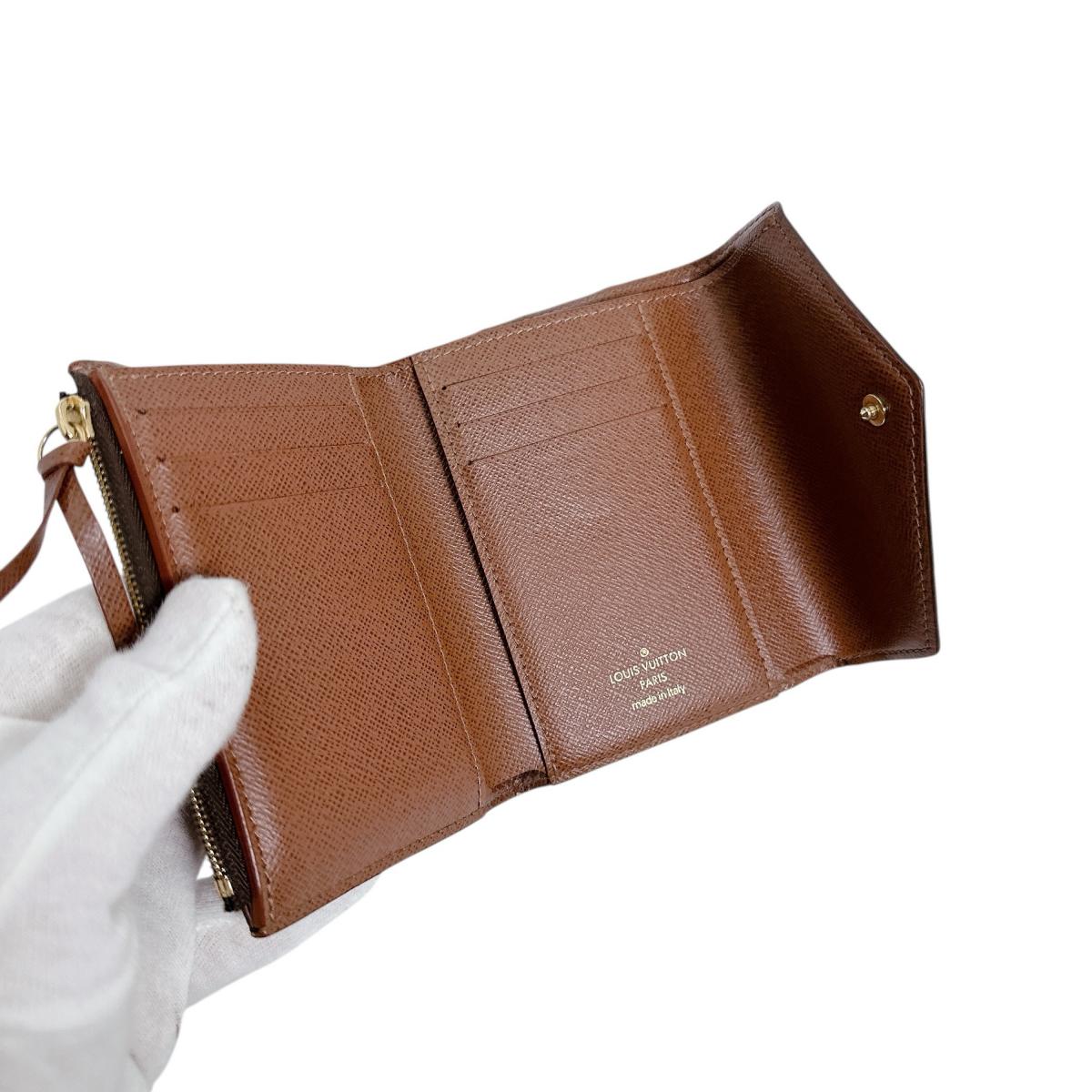 ルイヴィトン LOUIS VUITTON 三つ折り財布
 三つ折り財布 モノグラム ポルトフォイユ・ヴィクトリーヌ モノグラムキャンバス M62472 ブラウン LV
 【SS】
 【中古】