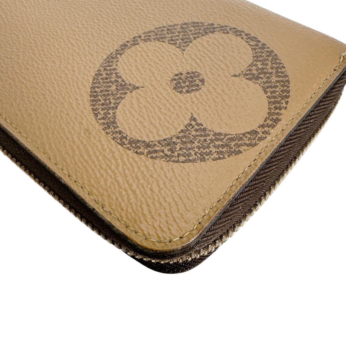 ルイヴィトン LOUIS VUITTON 長財布
 長財布 ジャイアントリバース ジッピー・ウォレット モノグラムキャンバス M69353 ブラウン LV
 【SS】
 【中古】