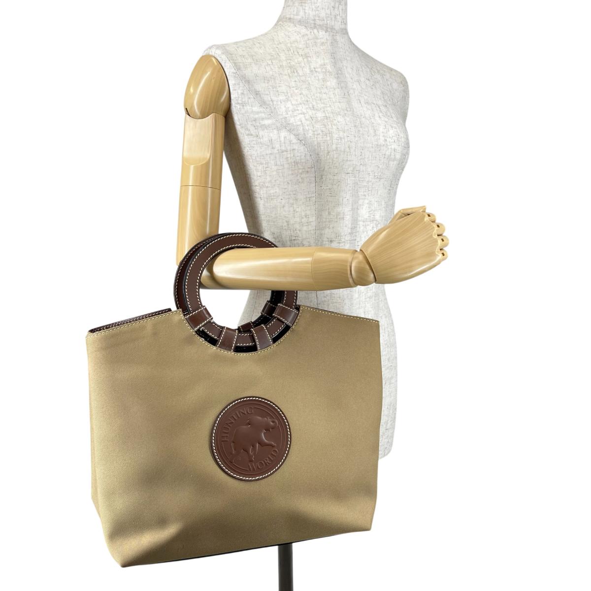 ハンティングワールド HUNTING WORLD ハンドバッグ
 ハンドバッグ ミリタリー サークルハンド キャンバス ベージュ 【SS】
 【中古】