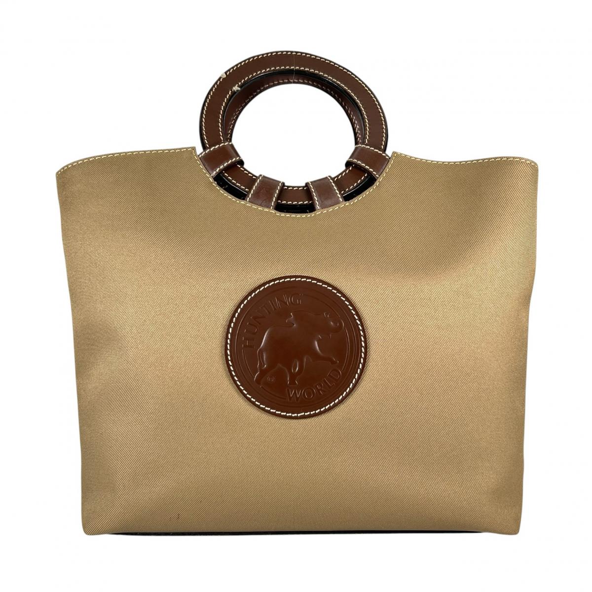 ハンティングワールド HUNTING WORLD ハンドバッグ
 ハンドバッグ ミリタリー サークルハンド キャンバス ベージュ 【SS】
 【中古】