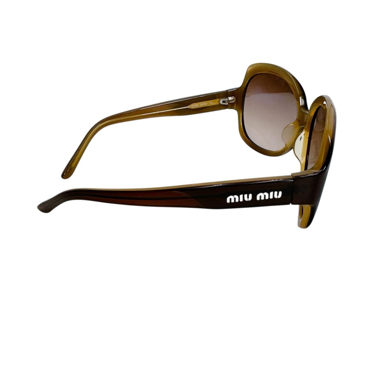 ミュウミュウ MIUMIU サングラス
 サングラス ADC2F1 135 59□16 プラスチック SMU06M ブラウン 【SS】
 【中古】