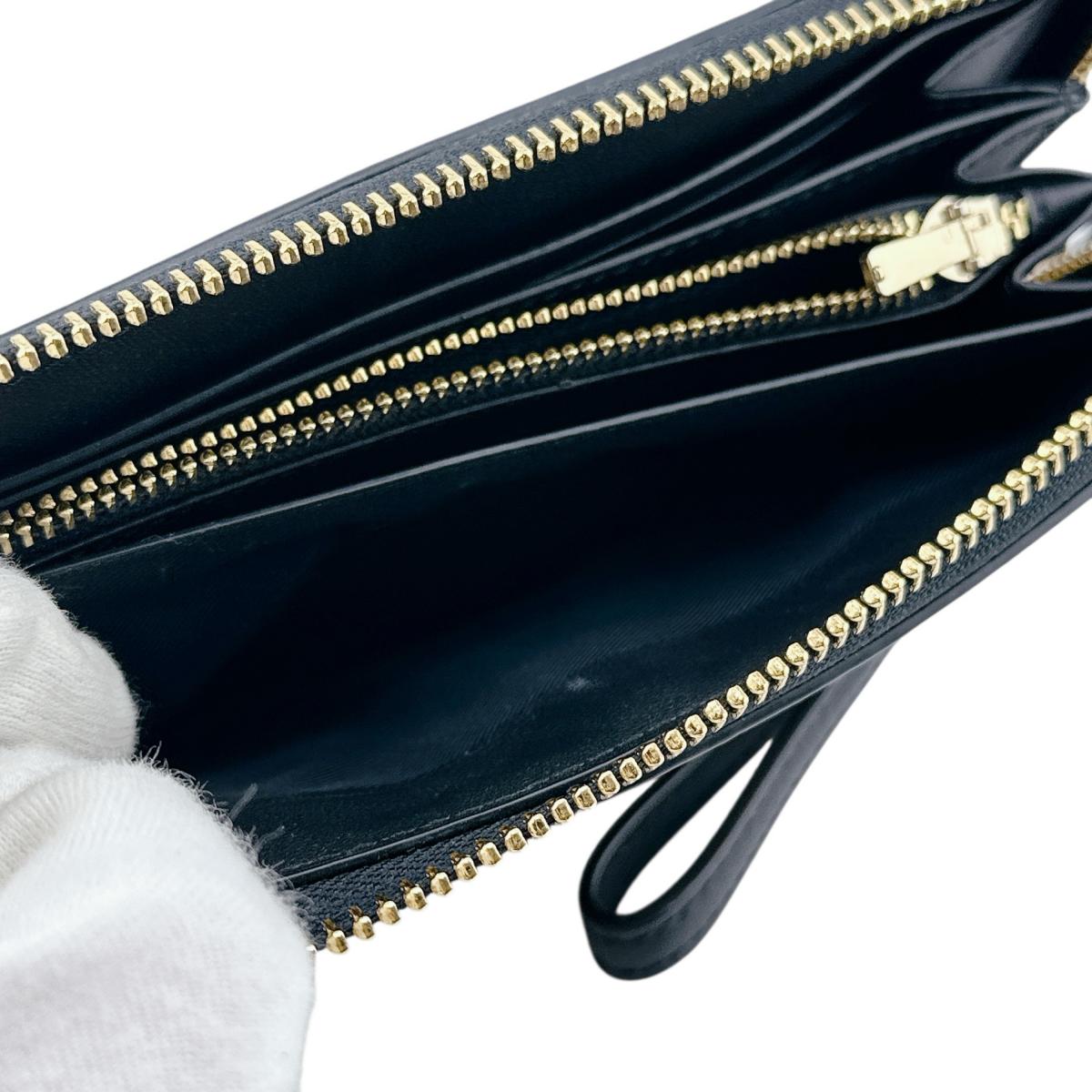 コーチ COACH 長財布
 長財布 シグネチャー ロングジップ アラウンド キャンバス C4452 カーキ×ブラック 【SS】
 【中古】