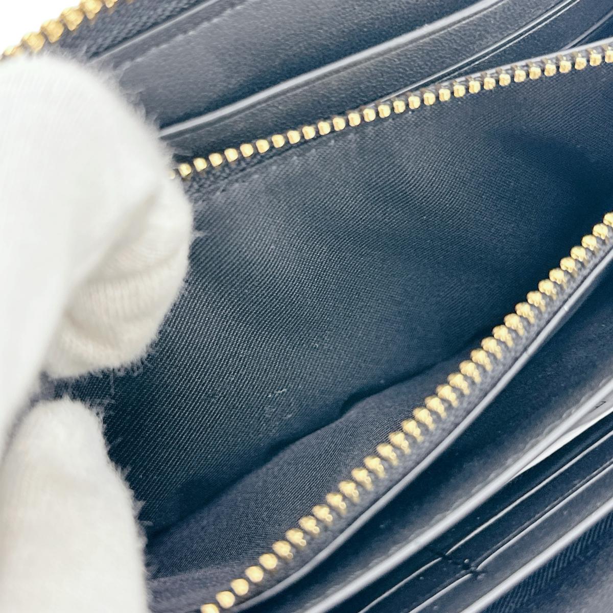 コーチ COACH 長財布
 長財布 シグネチャー ロングジップ アラウンド キャンバス C4452 カーキ×ブラック 【SS】
 【中古】