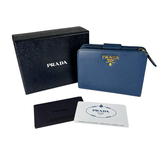 プラダ PRADA 二つ折り財布
 二つ折り財布 ジップアラウンド サフィアーノ レザー 1ML018 ブルー 【SS】
 【中古】