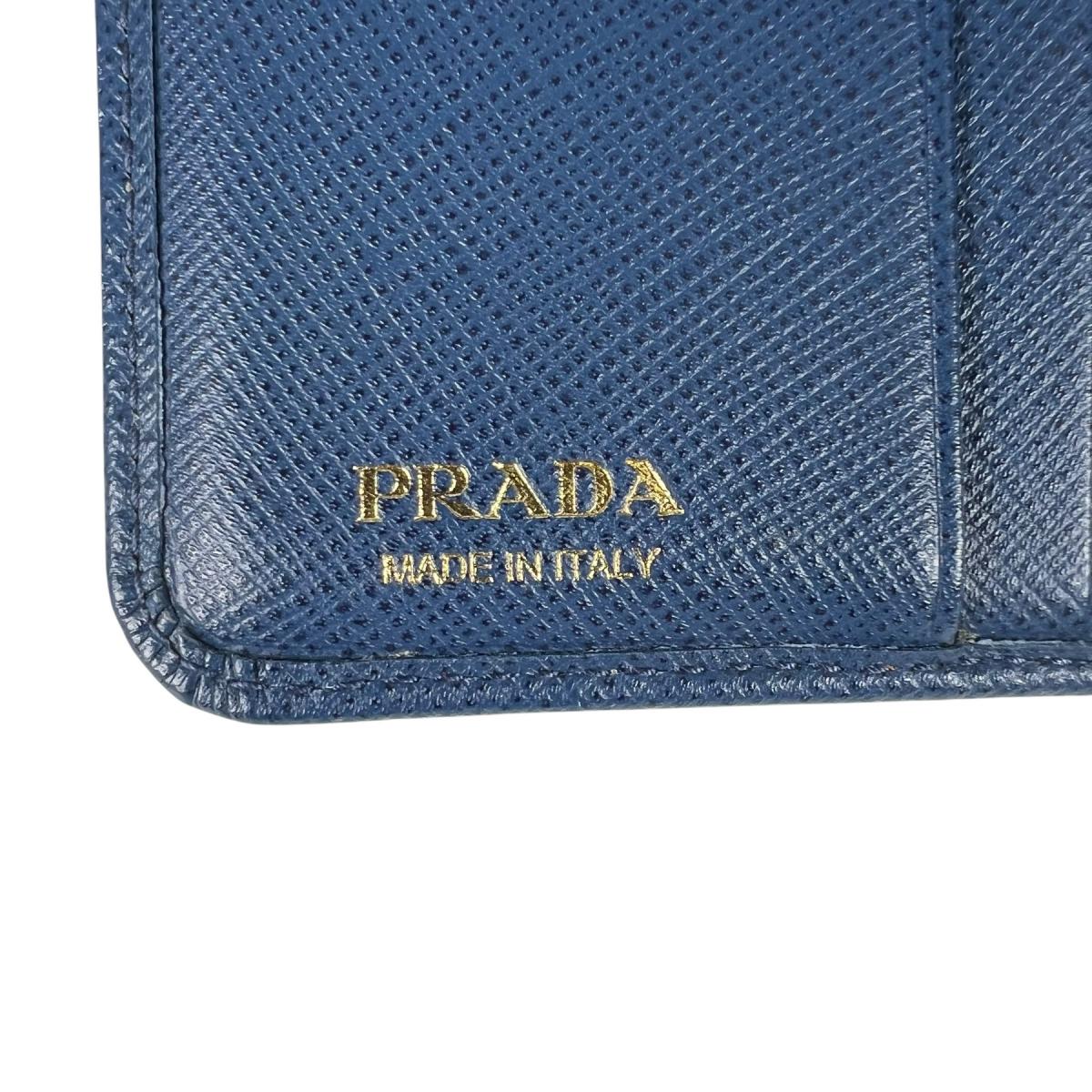 プラダ PRADA 二つ折り財布
 二つ折り財布 ジップアラウンド サフィアーノ レザー 1ML018 ブルー 【SS】
 【中古】
