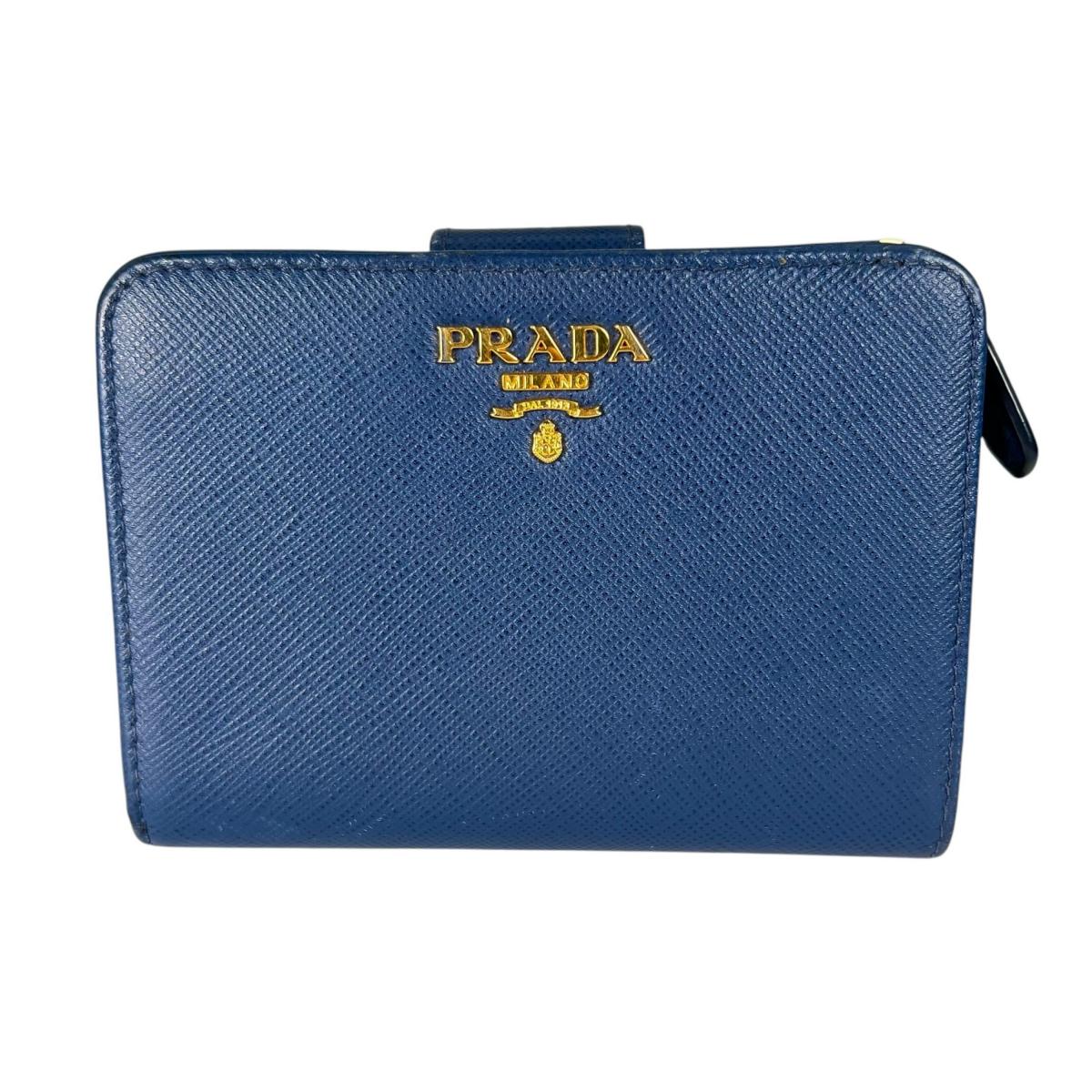 プラダ PRADA 二つ折り財布
 二つ折り財布 ジップアラウンド サフィアーノ レザー 1ML018 ブルー 【SS】
 【中古】