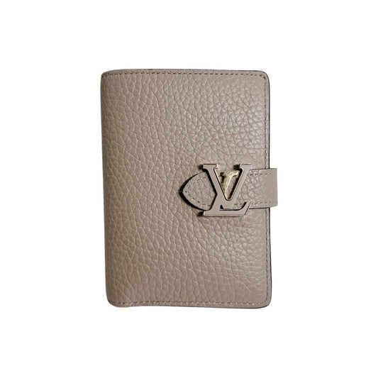 ルイヴィトン LOUIS VUITTON 二つ折り財布
 二つ折り財布 トリヨンレザー ヴェルティカルウォレットコンパクト レザー M82198 ベージュ LV
 【SS】
 【中古】