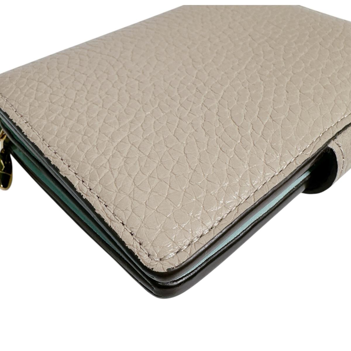 ルイヴィトン LOUIS VUITTON 二つ折り財布
 二つ折り財布 トリヨンレザー ヴェルティカルウォレットコンパクト レザー M82198 ベージュ LV
 【SS】
 【中古】