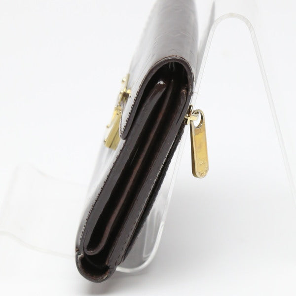 ルイヴィトン LOUIS VUITTON 三つ折り財布
 ポルトフォイユ・コアラ ヴェルニ 小銭入れ付 モノグラムヴェルニ M93520 アマラント LV
 【SS】
 【中古】