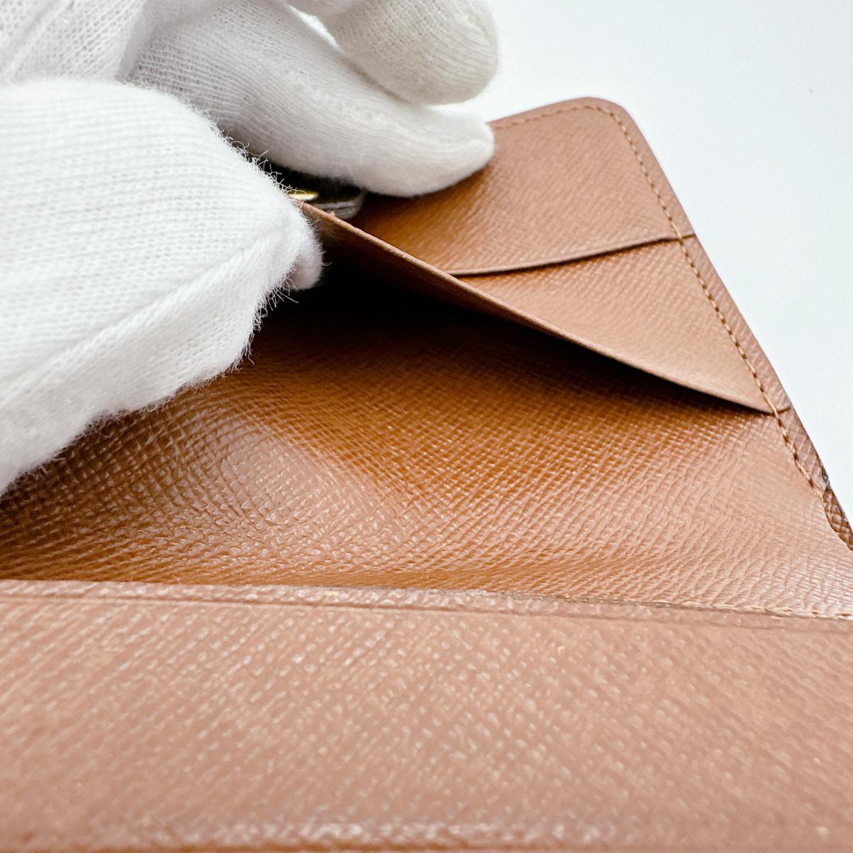 ルイヴィトン LOUIS VUITTON 二つ折り財布
 カード用ポケットファスナー付 モノグラム コンパクトジップ モノグラムキャンバス M61667 ブラウン LV
 【SS】
 【中古】