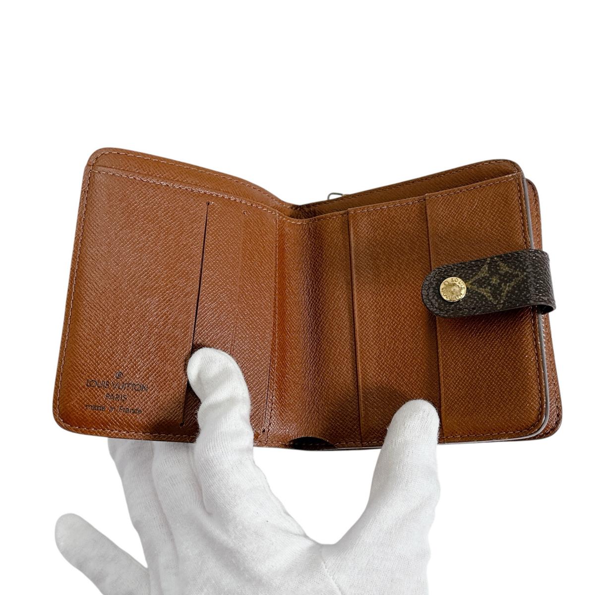 ルイヴィトン LOUIS VUITTON 二つ折り財布
 カード用ポケットファスナー付 モノグラム コンパクトジップ モノグラムキャンバス M61667 ブラウン LV
 【SS】
 【中古】