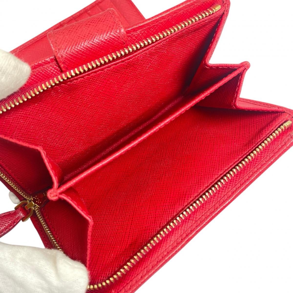 プラダ PRADA 二つ折り財布
 二つ折り財布 ジップアラウンド サフィアーノ レザー 1ML225 レッド 【SS】
 【中古】