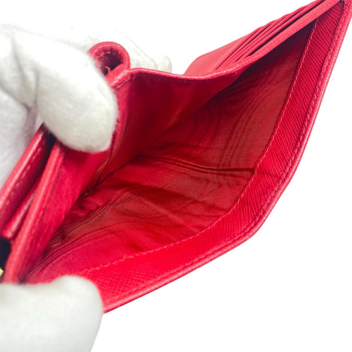 プラダ PRADA 二つ折り財布
 二つ折り財布 ジップアラウンド サフィアーノ レザー 1ML225 レッド 【SS】
 【中古】