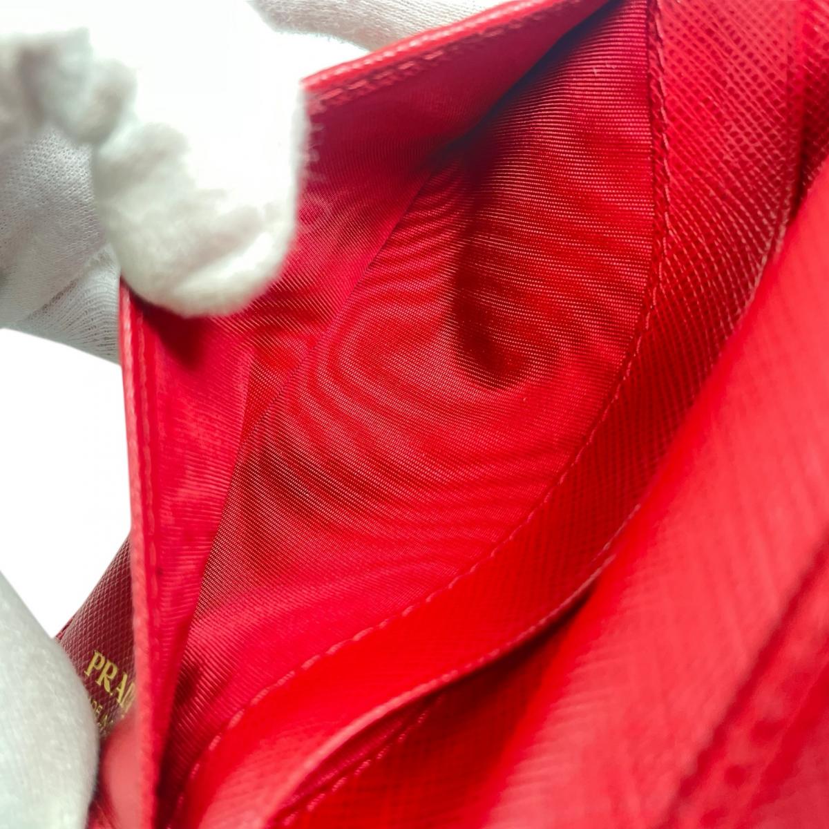 プラダ PRADA 二つ折り財布
 二つ折り財布 ジップアラウンド サフィアーノ レザー 1ML225 レッド 【SS】
 【中古】