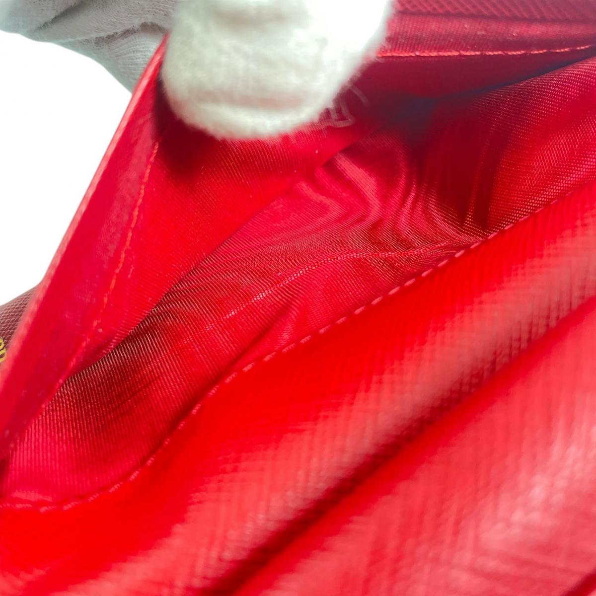 プラダ PRADA 二つ折り財布
 二つ折り財布 ジップアラウンド サフィアーノ レザー 1ML225 レッド 【SS】
 【中古】