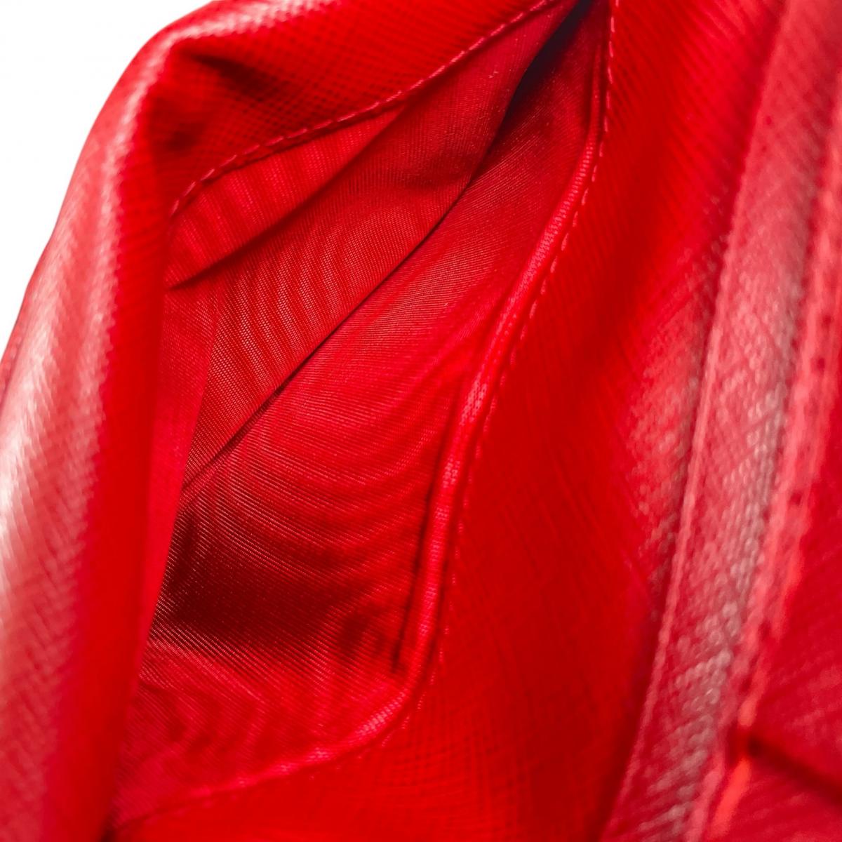 プラダ PRADA 二つ折り財布
 二つ折り財布 ジップアラウンド サフィアーノ レザー 1ML225 レッド 【SS】
 【中古】