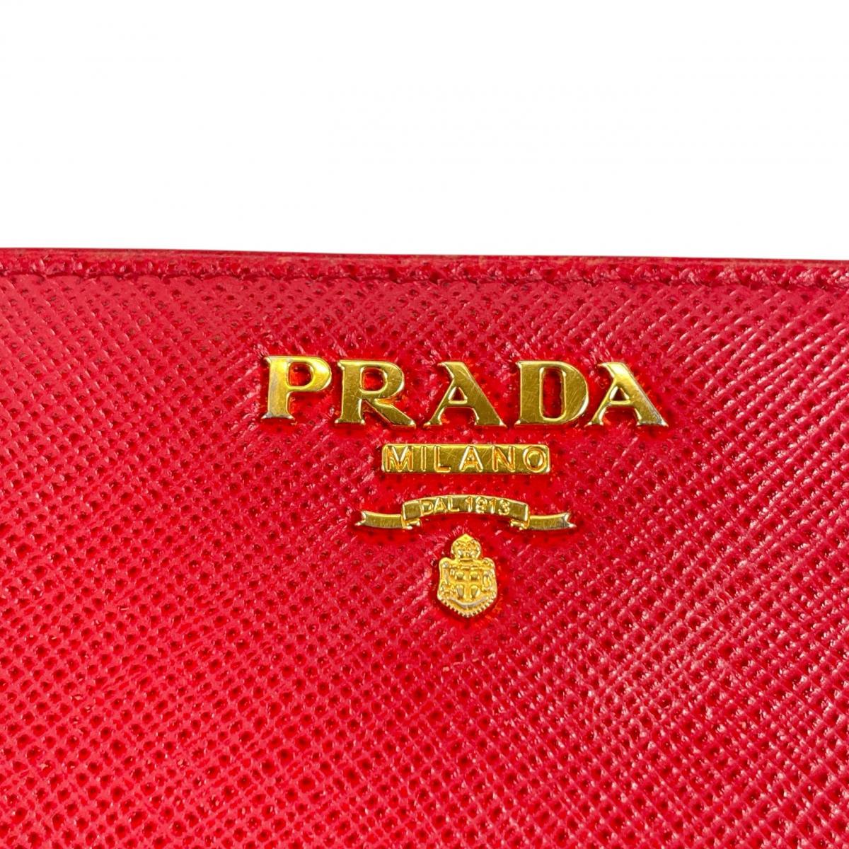 プラダ PRADA 二つ折り財布
 二つ折り財布 ジップアラウンド サフィアーノ レザー 1ML225 レッド 【SS】
 【中古】