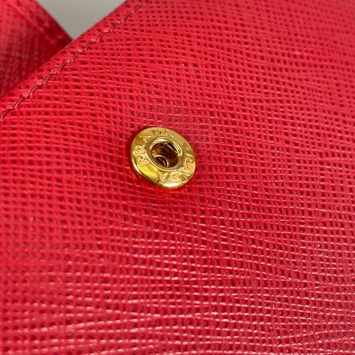 プラダ PRADA 二つ折り財布
 二つ折り財布 ジップアラウンド サフィアーノ レザー 1ML225 レッド 【SS】
 【中古】