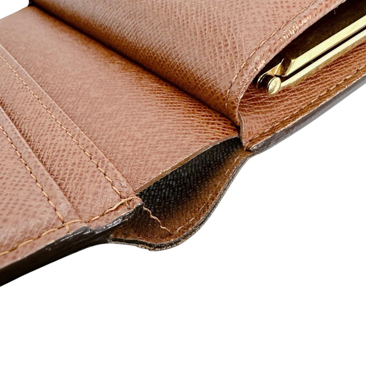 ルイヴィトン LOUIS VUITTON 二つ折り財布
 カード用ポケット付がま口財布 モノグラム ポルト モネ・ビエ ヴィエノア モノグラムキャンバス M61663 ブラウン LV
 【SS】
 【中古】