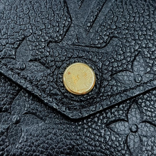 Louis Vuitton LOUIS VUITTON Tri-fold wallet
 Coin purse with card case Monogram Empreinte Portefeuille Zoe Monogram Empreinte M62935 Noir LV
 [SS]
 【second hand】 