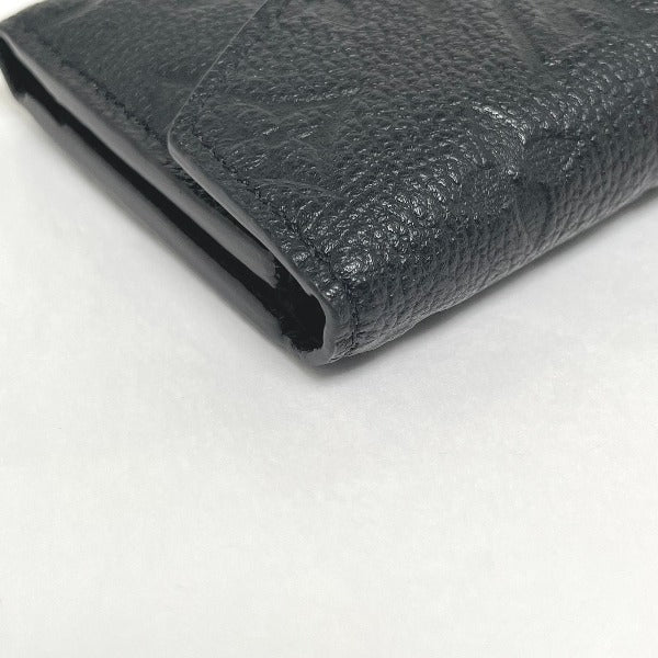 Louis Vuitton LOUIS VUITTON Tri-fold wallet
 Coin purse with card case Monogram Empreinte Portefeuille Zoe Monogram Empreinte M62935 Noir LV
 [SS]
 【second hand】 