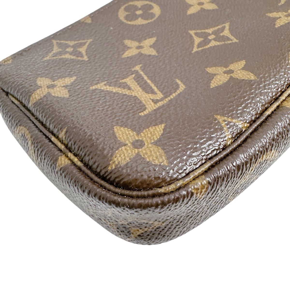 ルイヴィトン LOUIS VUITTON ポーチ
 ミニアクセサリーポーチ モノグラム ミニ・ポシェット・アクセソワール モノグラムキャンバス M58009 ブラウン LV
 【SS】
 【中古】