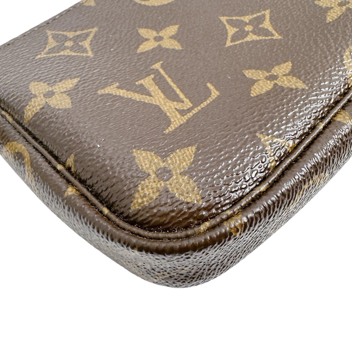 ルイヴィトン LOUIS VUITTON ポーチ
 ミニアクセサリーポーチ モノグラム ミニ・ポシェット・アクセソワール モノグラムキャンバス M58009 ブラウン LV
 【SS】
 【中古】